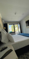 GRAND HOTEL CARAIMAN.