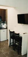 A. MAOS HOTEL APARTMENTS