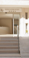 Grand TheoNi Hotel Suites & Spa