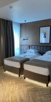 . GRAND COROANA