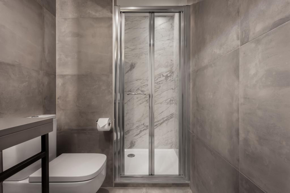 115 THE STRAND HOTEL AND SUITES
