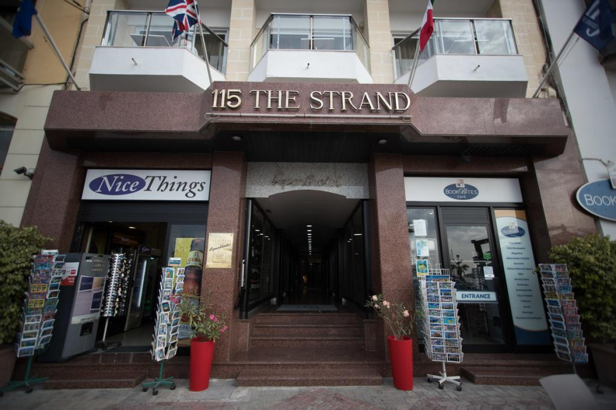 115 THE STRAND HOTEL AND SUITES
