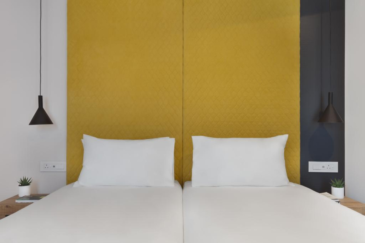 115 THE STRAND HOTEL AND SUITES
