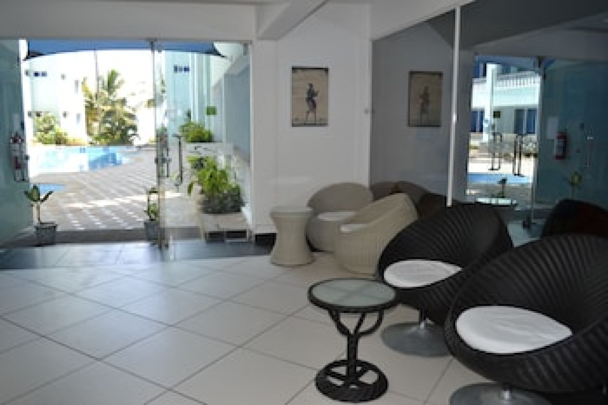 COWRIE SHELL BEACH APARTMENTS