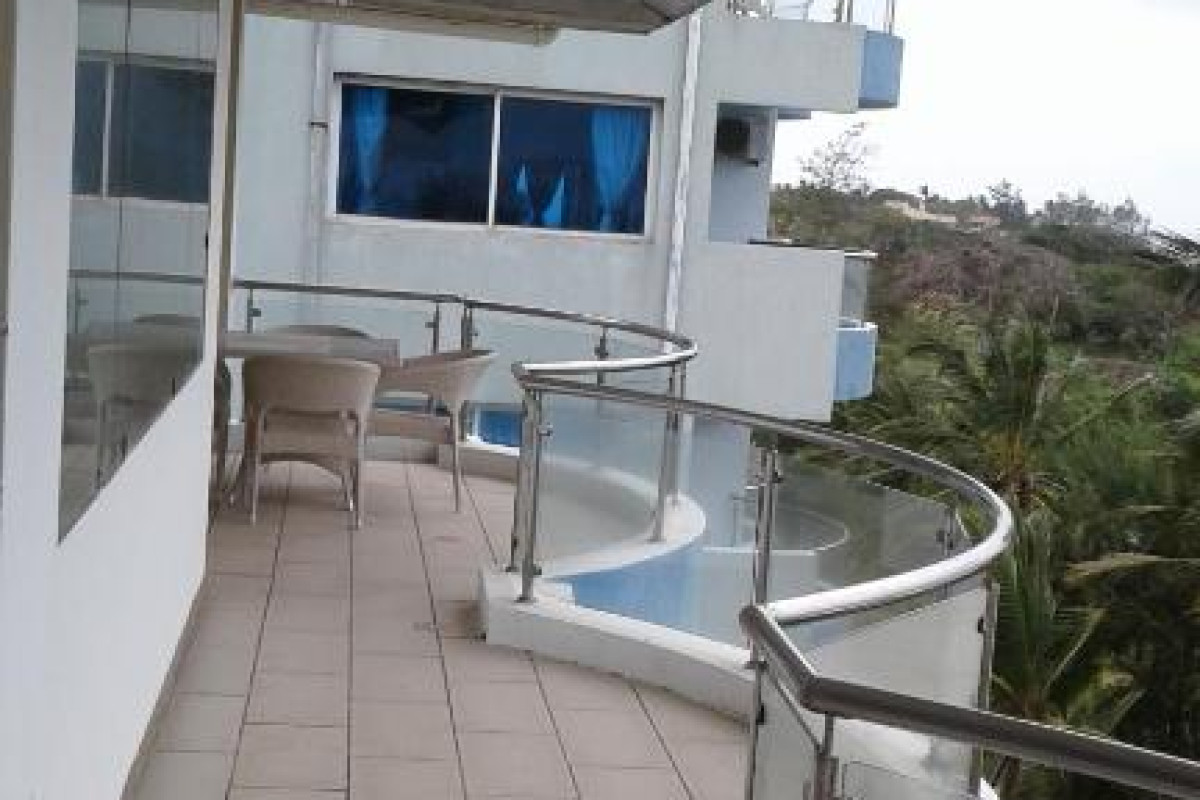 Cowrie Shell Beach Apartments