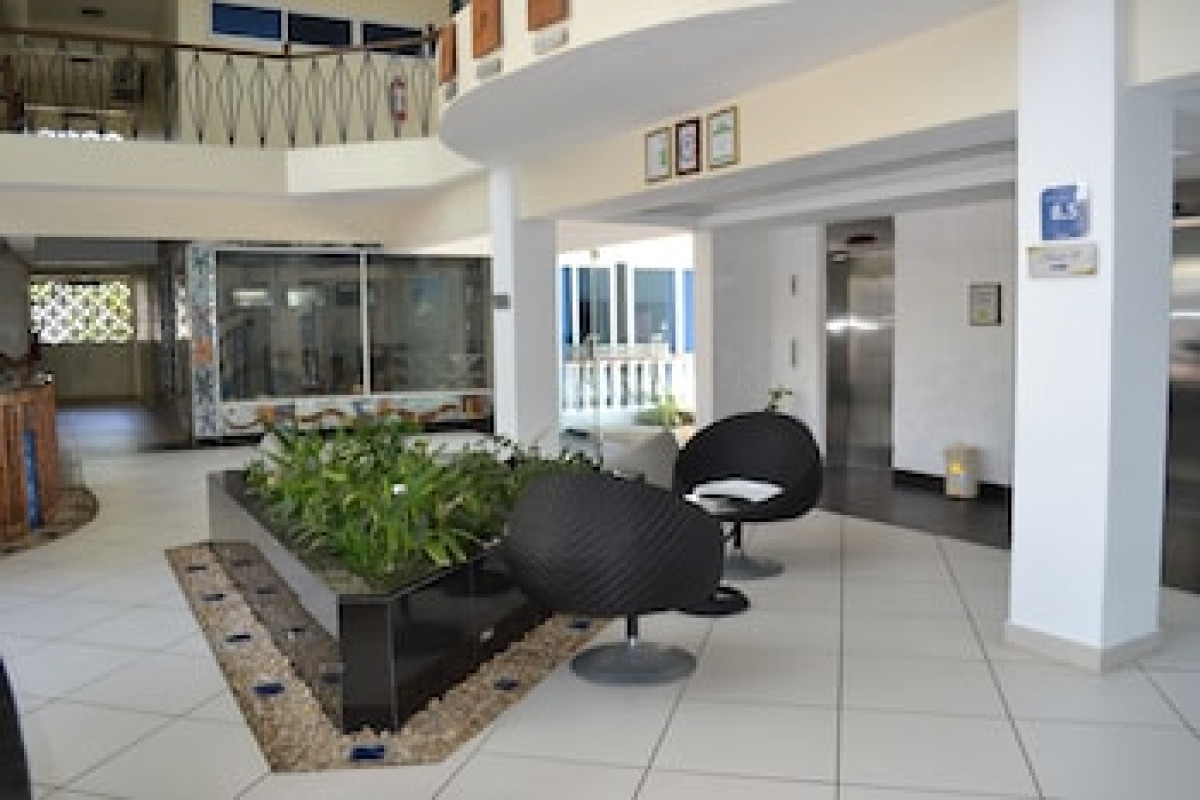 COWRIE SHELL BEACH APARTMENTS
