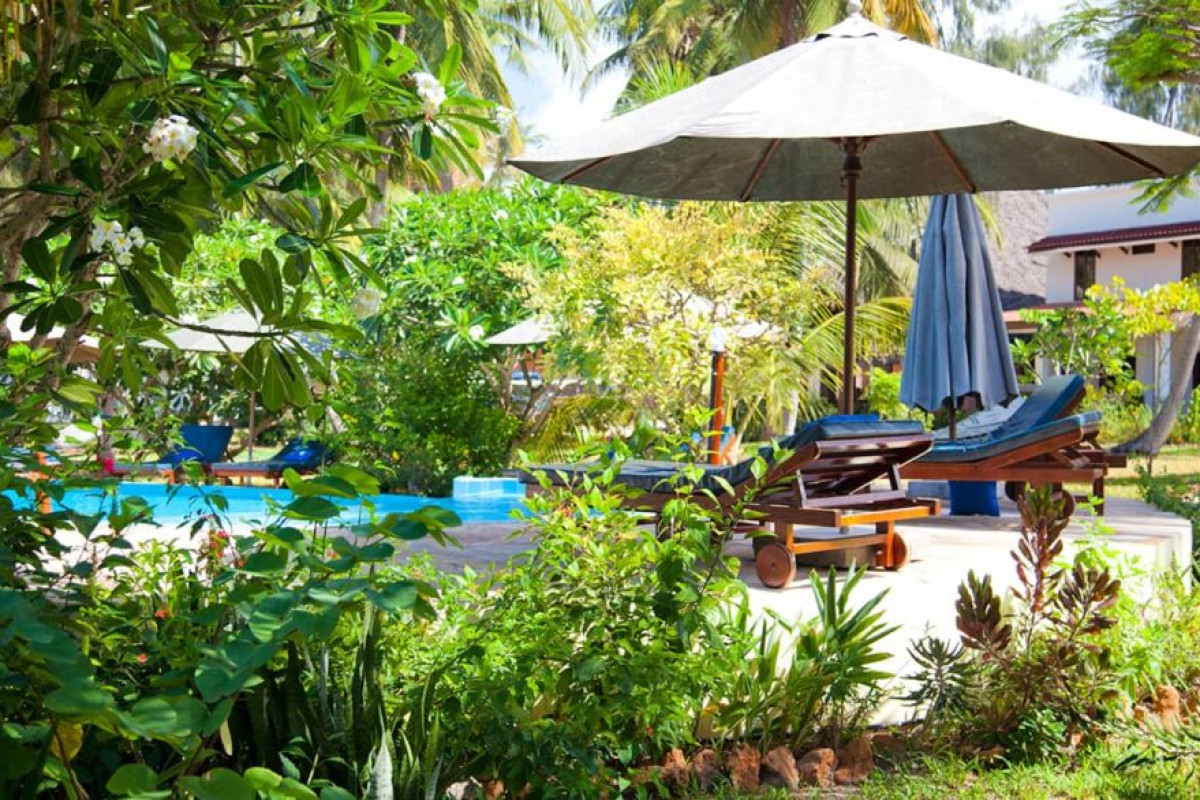 Flame Tree Cottage Hotel