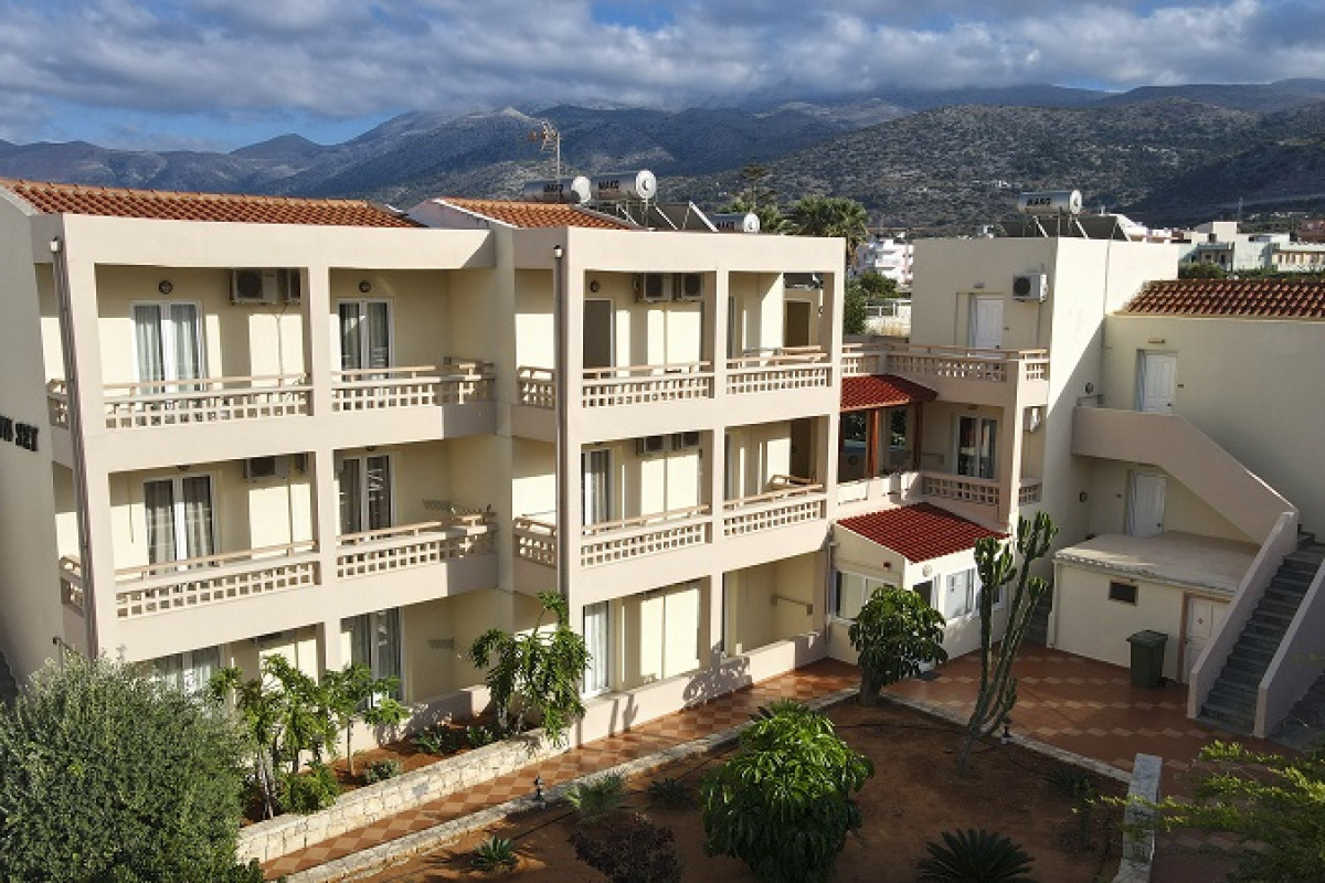 SUNSET APARTMENTS