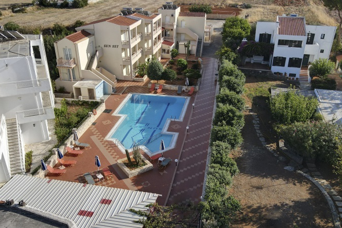 SUNSET APARTMENTS