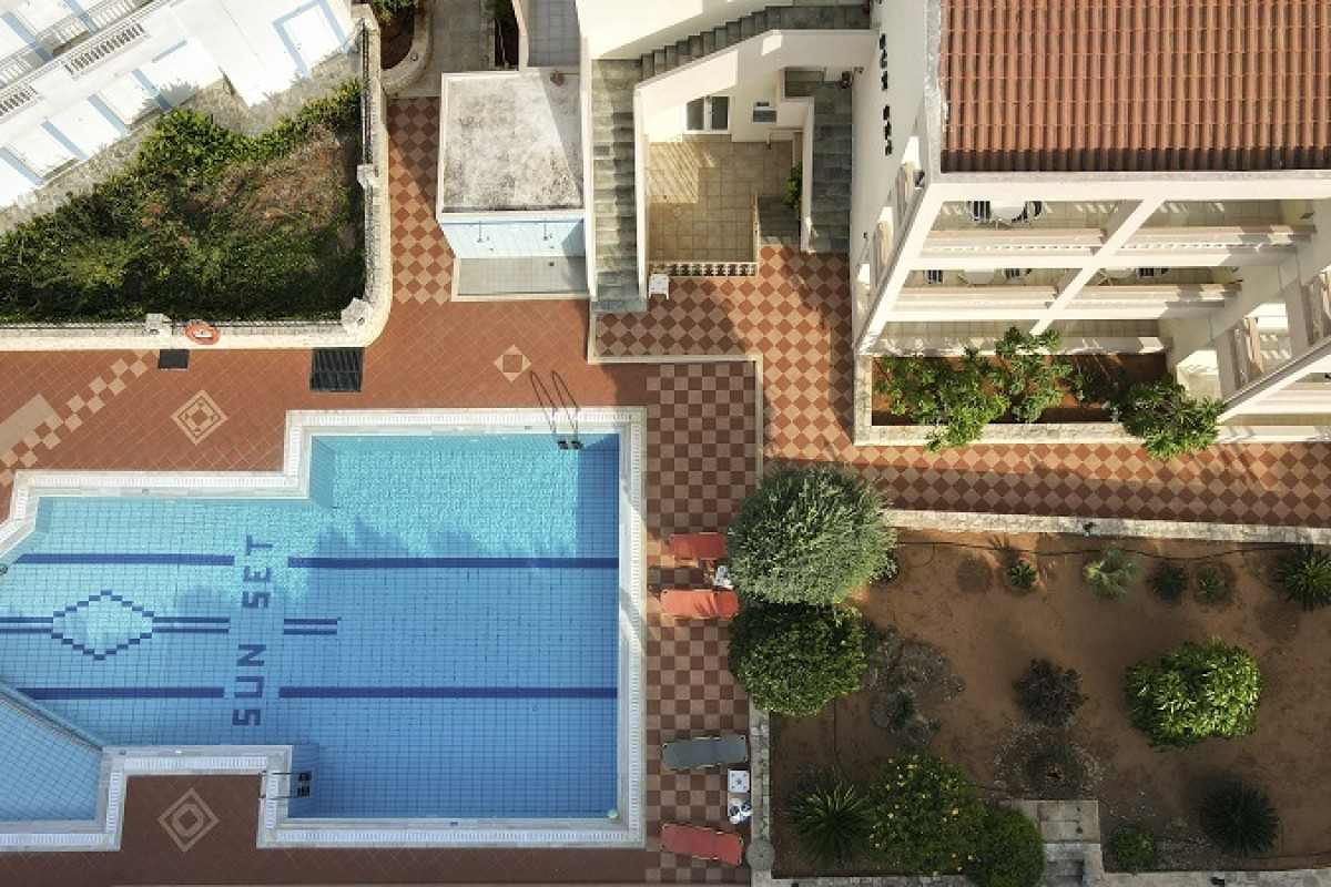 SUNSET APARTMENTS
