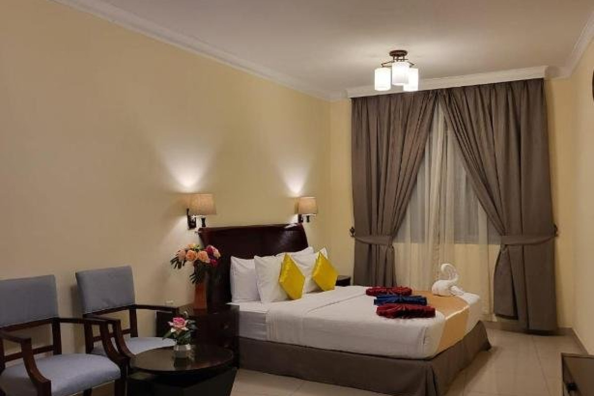 Capital O 401 Crown Palace Hotel