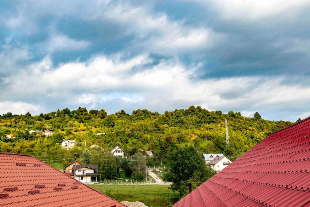 Pensiunea Raiul de pe Rau ( Moroeni)