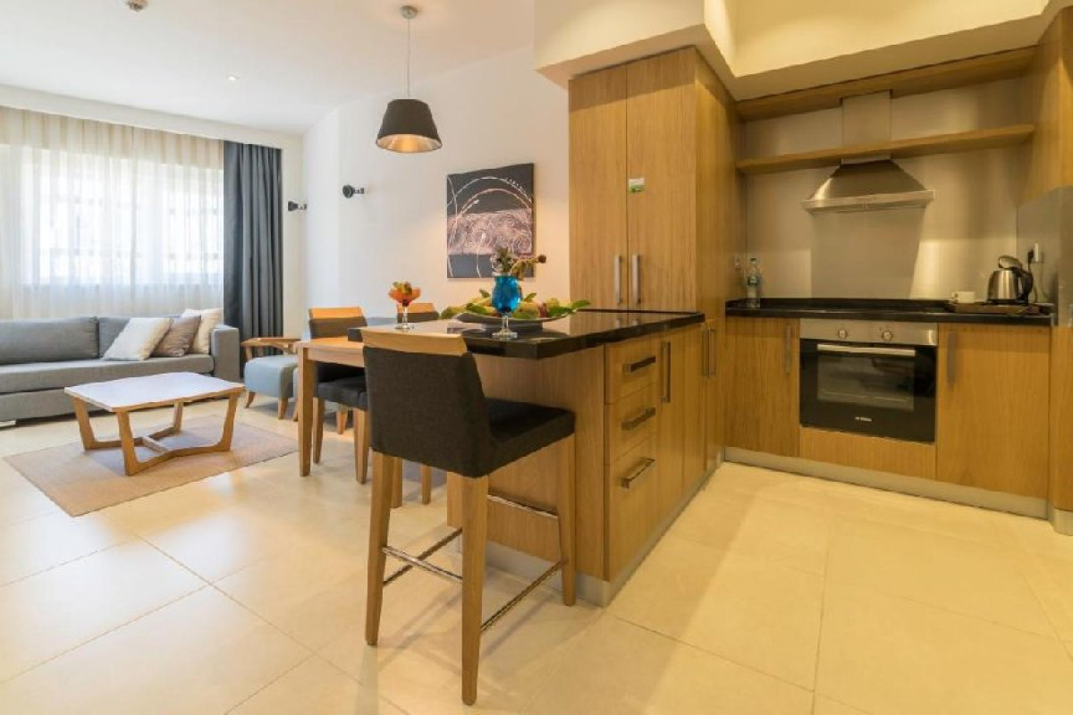 RAMADA HOTEL AND SUITES
