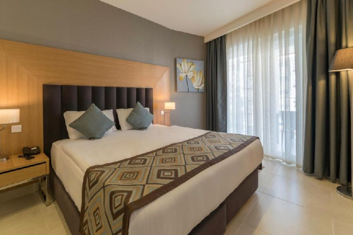 RAMADA HOTEL AND SUITES