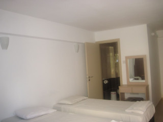 A. MAOS HOTEL APARTMENTS