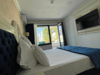GRAND HOTEL CARAIMAN.