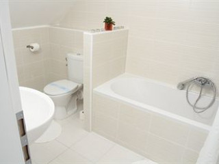 CORVIN PLAZA APARTMENTS AND SUITES