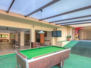 A. MAOS HOTEL APARTMENTS