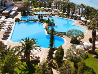 MG HOTELS WHITE LILYUM HOTEL
