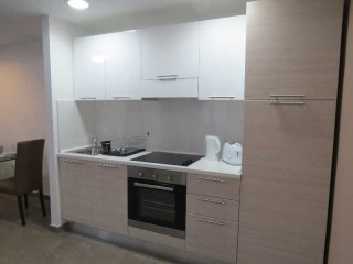 STRAND SUITES