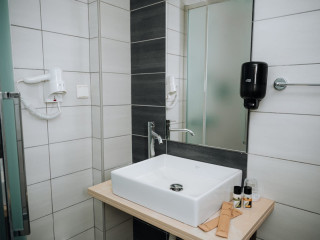 Amphitryon City Hotel