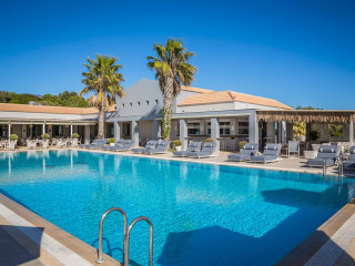 Astra Village Hotel & Suites