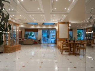 ATRIUM HOTEL AND SUITES