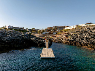 AULUS CHANIA, Curio Collection by Hilton