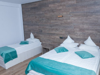 . SIM House Pensiune Turistica