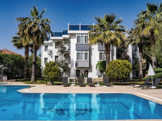 CARRINGTON SUITES HOTEL