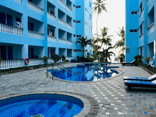 Cowrie Shell Beach Apartments