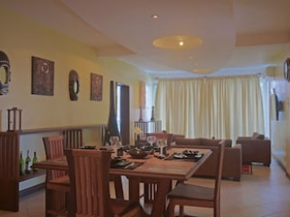 COWRIE SHELL BEACH APARTMENTS