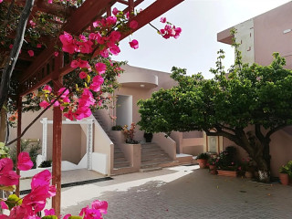 EVINA ROOMS & SUITES HOTEL 