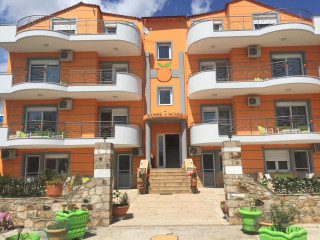 Orange House Apartments & Suites