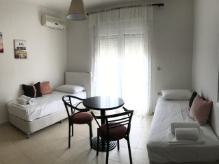 Orange House Apartments & Suites