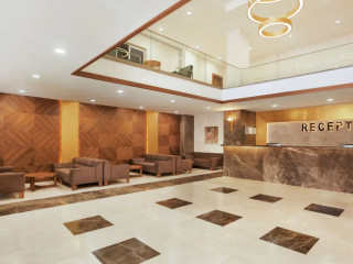 RAMADA HOTEL & SUITES