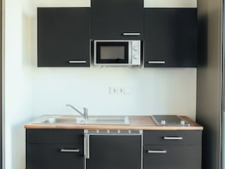 THE RIX STUDIOS AND SUITES