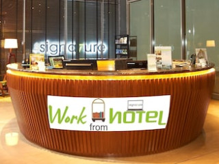 THE SIGNATURE SERVICED SUITES & STUDIOS