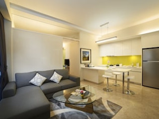 THE SIGNATURE SERVICED SUITES & STUDIOS