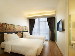 THE SIGNATURE SERVICED SUITES & STUDIOS