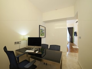 THE SIGNATURE SERVICED SUITES & STUDIOS