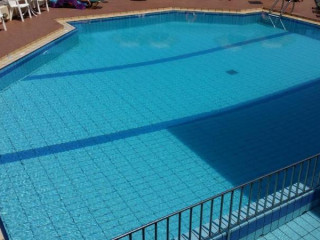 Theos Village Apartments