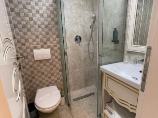 GRAND HOTEL CARAIMAN.