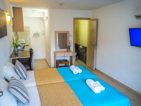 A. MAOS HOTEL APARTMENTS