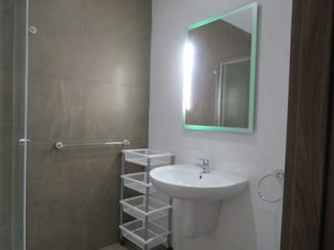 115 THE STRAND SUITES