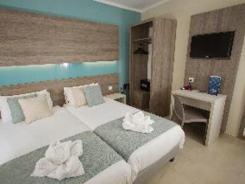 115 THE STRAND HOTEL amp; SUITES