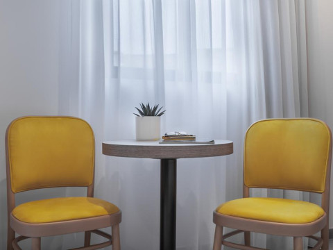 115 THE STRAND HOTEL AND SUITES