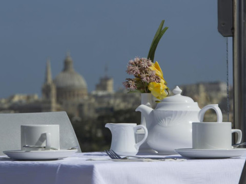 115 THE STRAND HOTEL AND SUITES