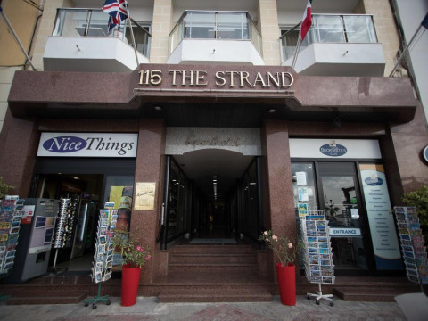 115 THE STRAND HOTEL AND SUITES