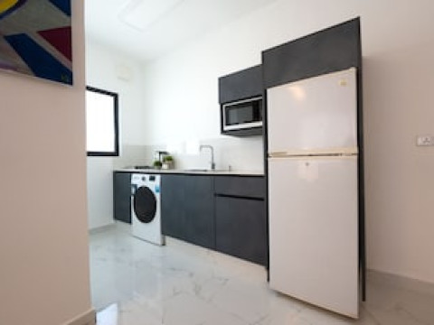 AL KAWTHER APARTMENTS HOTEL